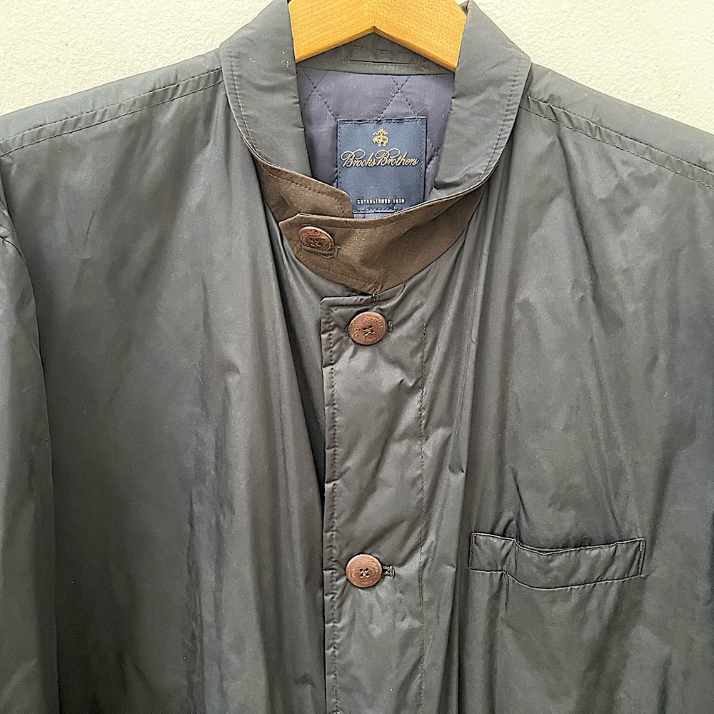 Brooks Brothers black raincoat.